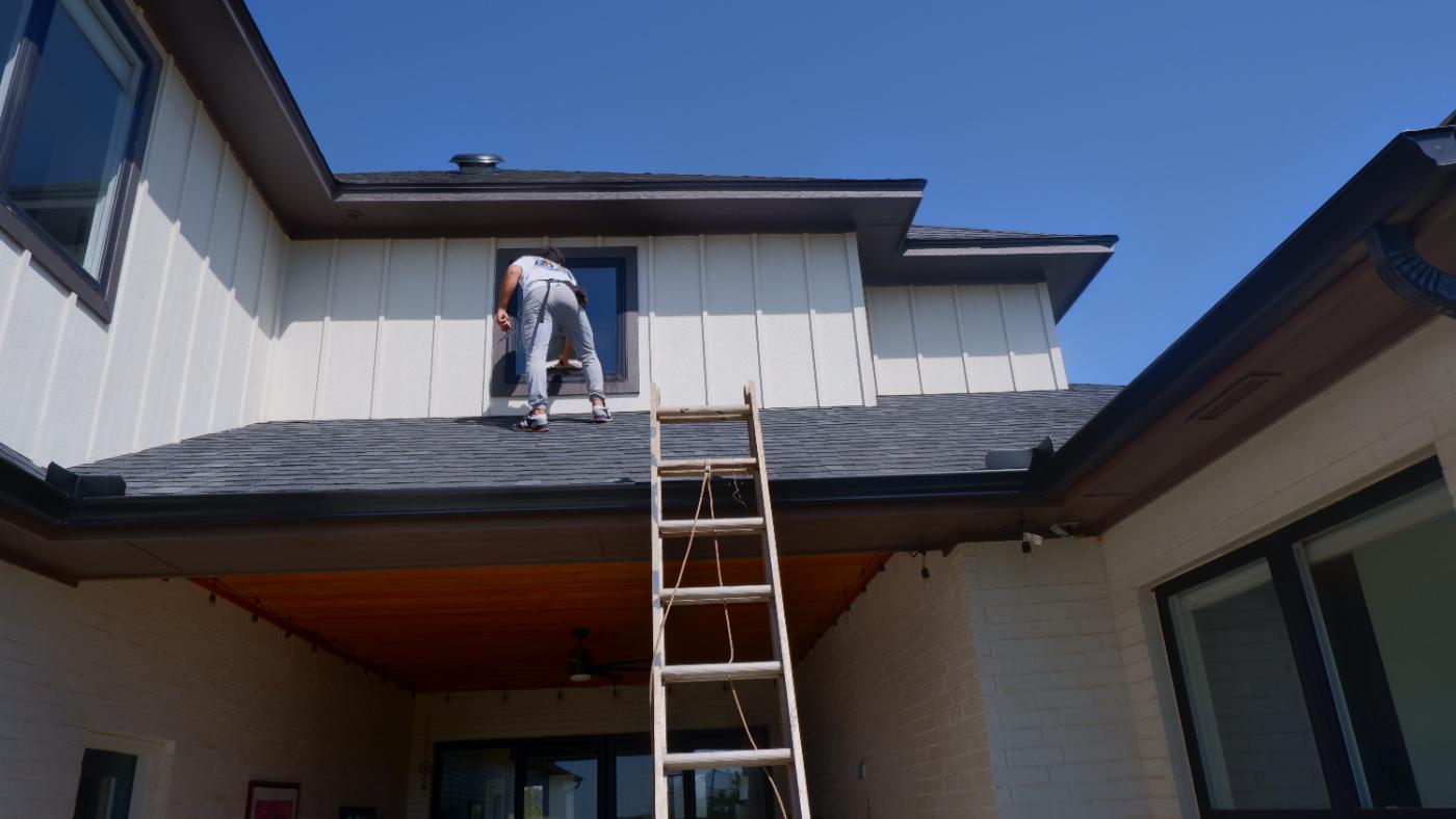 Squeegeeing a second-story window
